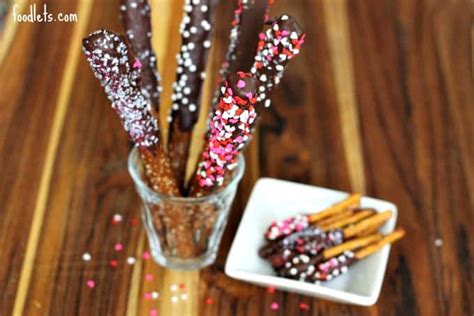 chocolate-covered-mini-pretzel-sticks-with-sprinkles image