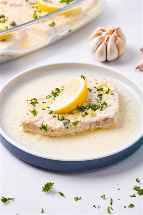 baked-swordfish-recipe-with-lemon-garlic-cream-sauce image