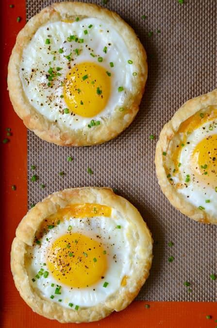cheesy-puff-pastry-baked-eggs-just-a-taste image