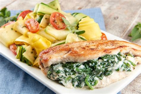 spinach-and-ricotta-stuffed-chicken-breasts image