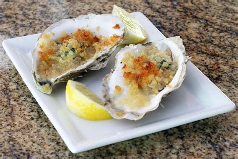 easy-butter-and-herb-baked-oysters-recipe-the-spruce image