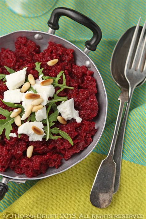 beetroot-risotto-with-goats-cheese-and-pine-nuts image