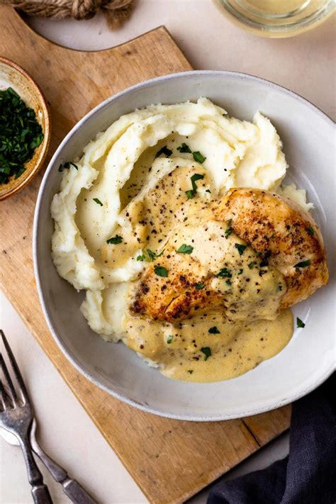 chicken-with-creamy-dijon-sauce-and-mashed-potatoes image