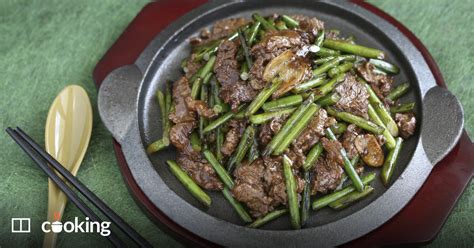stir-fried-beef-with-garlic-scapes-recipe-scmp-cooking image