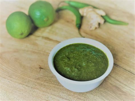 mint-cilantro-chutney-indian-green-piping-pot-curry image