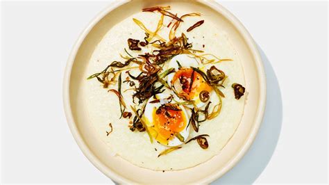 cheesy-grits-with-scallions-and-jammy-eggs-recipe-bon image
