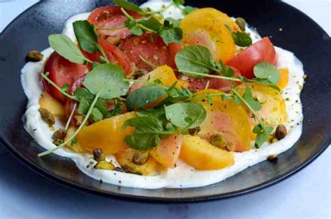 tomato-and-peach-salad-with-whipped-goat-cheese image