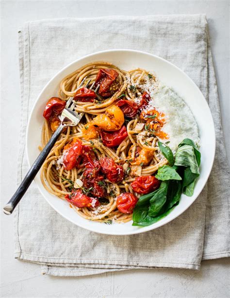 burst-cherry-tomato-pasta-sauce-familystyle-food image