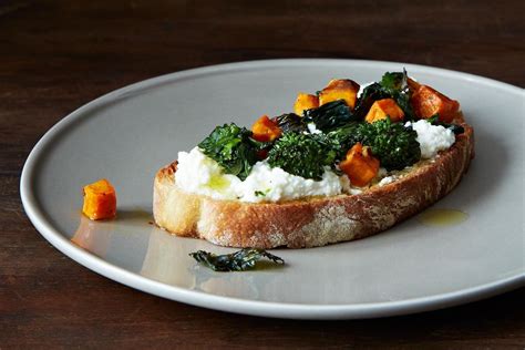 roasted-broccoli-rabe-sweet-potato-ricotta-crostini image