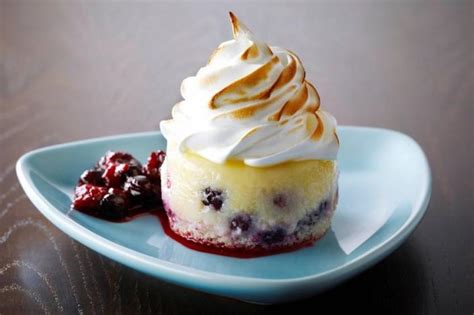 lemon-berry-meringue-cakes-with-bumbleberry-sauce image