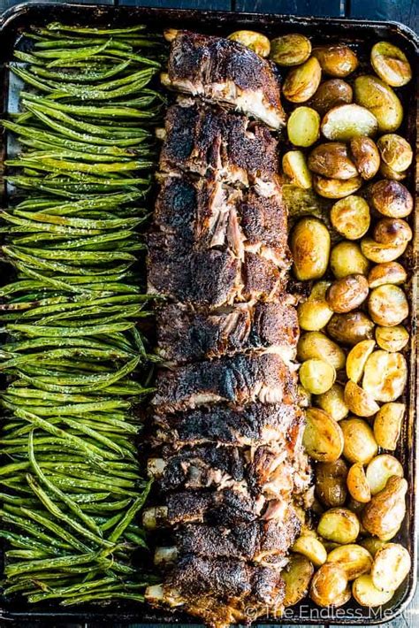oven-baked-ribs-with-potatoes-and-green-beans-the image