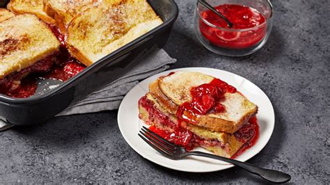 baked-french-toast-with-strawberry-sauce-washington image