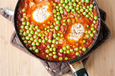portuguese-braised-peas-with-eggs-and-chourico image