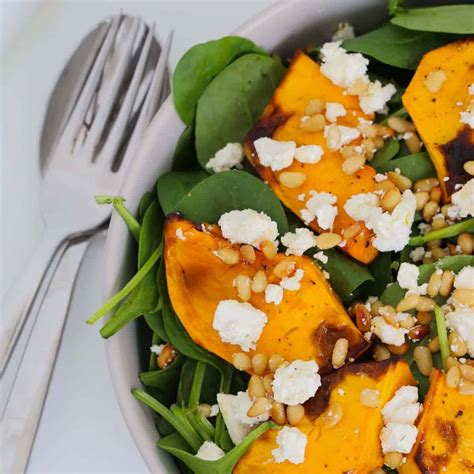 roast-pumpkin-salad-with-feta-pine-nuts-baby-spinach image