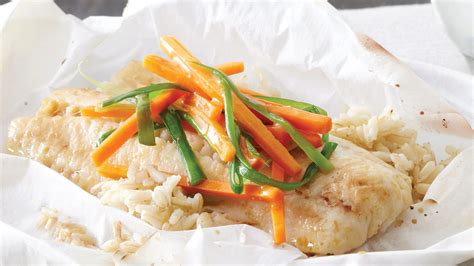 steamed-ginger-cod-packets-with-rice-vegetables image