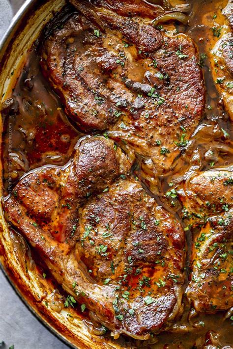 braised-pork-steak-with-onions-and-stout-oven-craft image