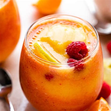 citrus-raspberry-mango-layered-smoothie image