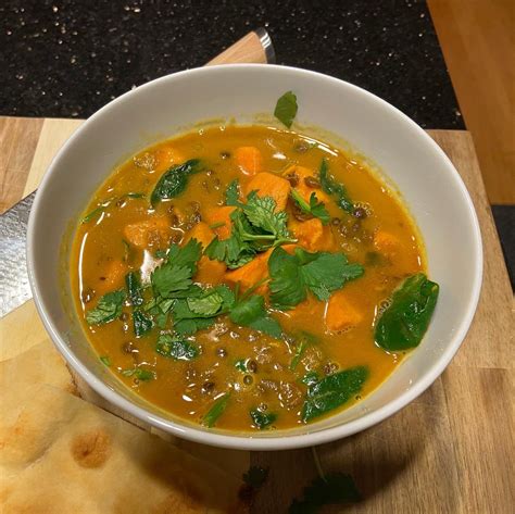 red-curry-lentils-with-sweet-potatoes-and-spinach image