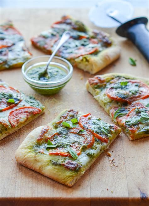 pesto-pizza-with-fresh-tomatoes-mozzarella image