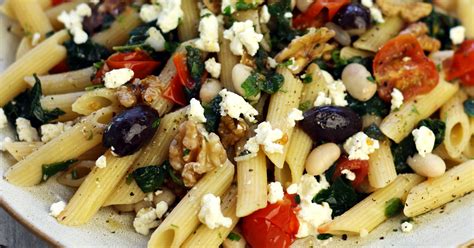 greek-style-pasta-with-white-beans-walnuts-spinach image