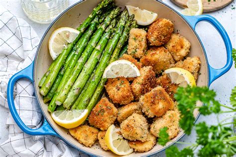 garlic-butter-chicken-bites-with-lemon-asparagus image