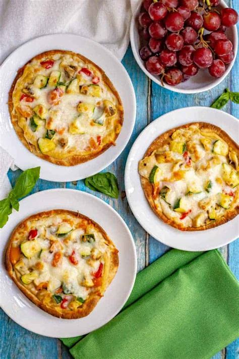 hummus-pita-pizza-with-veggies-family-food-on-the image