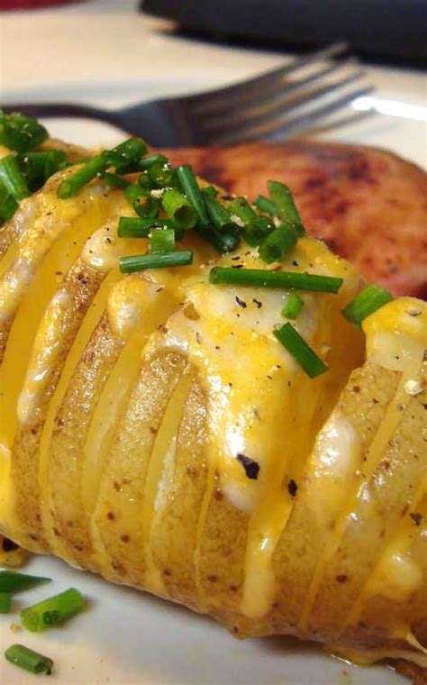 cheesy-fan-potatoes-recipe-flavorite image