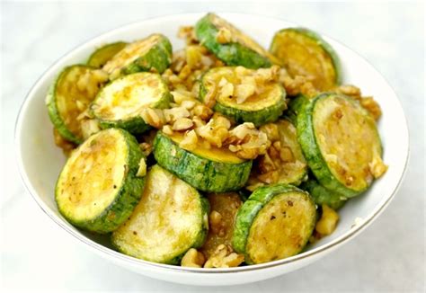 sauted-zucchini-with-walnuts-olive-tomato image
