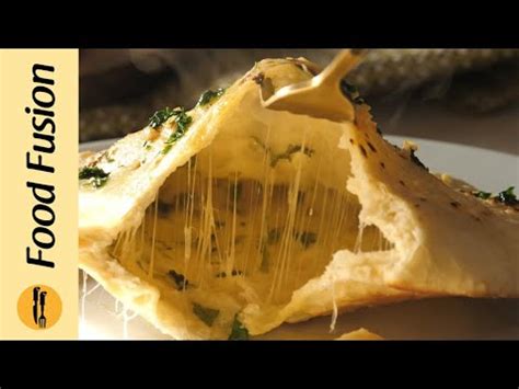cheesy-garlic-naan-recipe-by-food-fusion-youtube image
