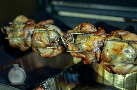 rotisserie-cornish-hens-on-a-spit-feeding-the-famished image