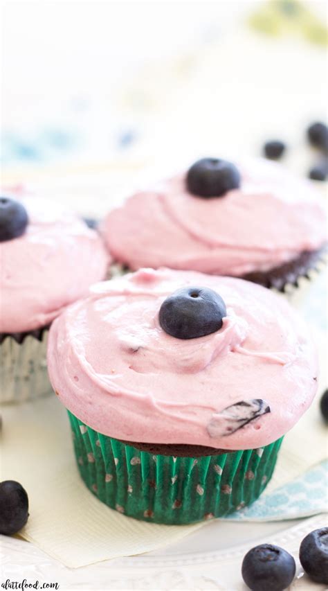 milk-chocolate-cupcakes-with-blueberry-frosting-a image