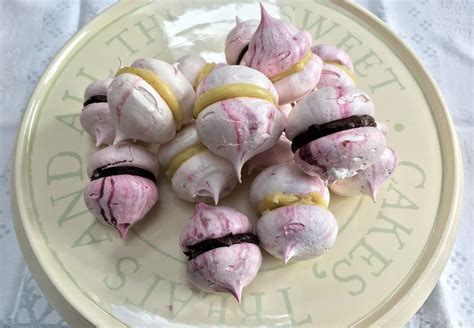 meringue-kisses-with-chocolate-filling-recipe-cuisine image