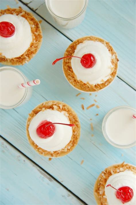 coconut-laced-tres-leches-cupcakes-the-kitchen image