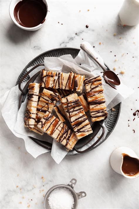 chocolate-caramel-shortbread-bars-broma-bakery image