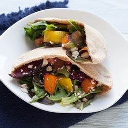 pita-pockets-with-roasted-veggies-and-hummus image