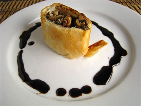 mushroom-and-goat-cheese-strudel-with-balsamic-syrup image