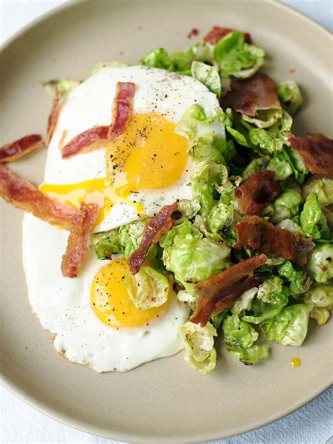 hash-browns-with-fried-eggs-and-bacon image