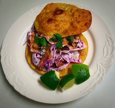 steak-tostadas-with-cashew-salsa-and-red-cabbage-slaw image