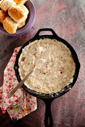savory-sausage-bacon-biscuits-and-gravy image