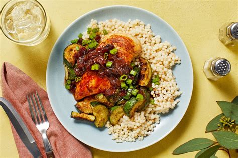 chicken-with-cranberries-and-couscous-recipe-hellofresh image