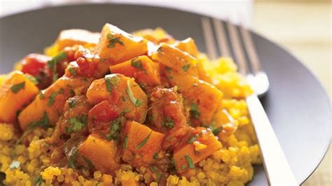 quinoa-with-moroccan-winter-squash-and-carrot-stew image