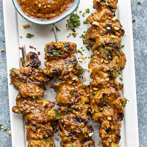 chicken-satay-with-peanut-sauce-chili-pepper-madness image