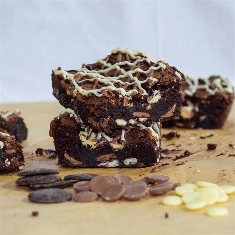fudgy-triple-chocolate-brownies-recipe-sweet-mouth-joy image