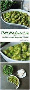 potato-gnocchi-with-arugula-pesto-and-gorgonzola image