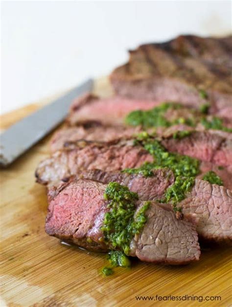 grilled-ny-strip-steak-with-basil-garlic-sauce-fearless image