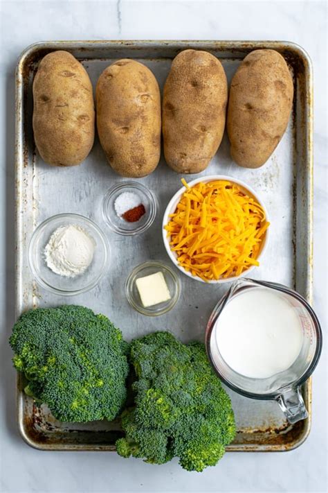 easy-broccoli-cheese-baked-potatoes-recipe-the-schmidty-wife image