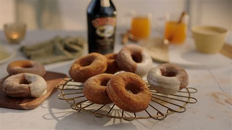 spiced-apple-donuts-recipe-with-baileys-glaze-baileys image