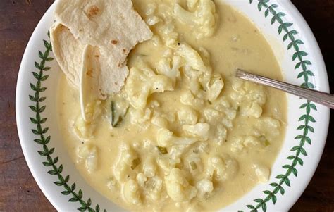creamy-cauliflower-potato-soup-with-cheese-edible image