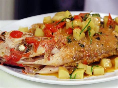 moist-roasted-whole-red-snapper-with-tomatoes-basil image