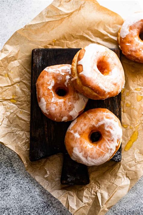 baked-apple-cider-doughnuts-with-maple-glaze-easy image